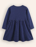 Blaues Kleid mit Schmetterlingsapplikation und Knopfleiste vorne