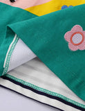 Vestido a rayas con aplicación de unicornio arcoíris