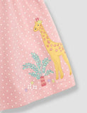 Korallenrosa Kleid mit Giraffen-Applikation und Knopfleiste vorne